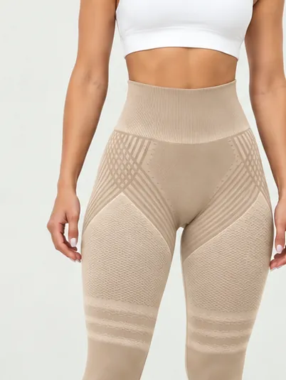 Legginsy modelujące Elevime w kolorze beżowym, przód: wysoki stan i teksturowana dzianina 3D